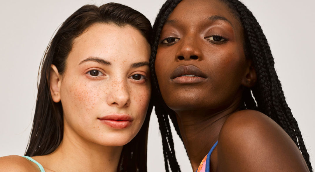 close up portrait of two women in studio
