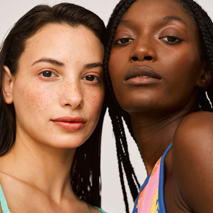 close up portrait of two women in studio