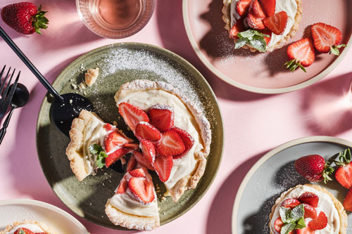 strawberry tarts on pink background