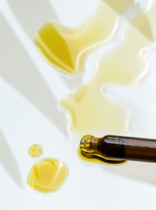 oil serum on white background