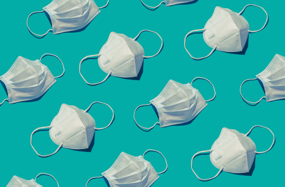 surgical medical face mask repetition pattern on blue background