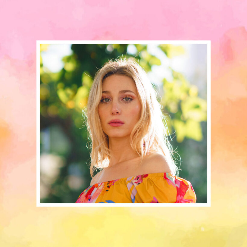 portrait of Corey Rae on pink and orange watercolor background