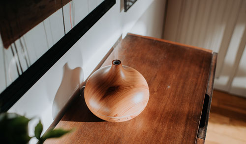 diffuser mists a blend of essential oil and water into the air.