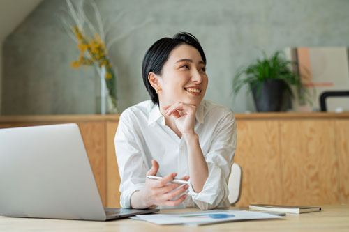 woman in office smiling