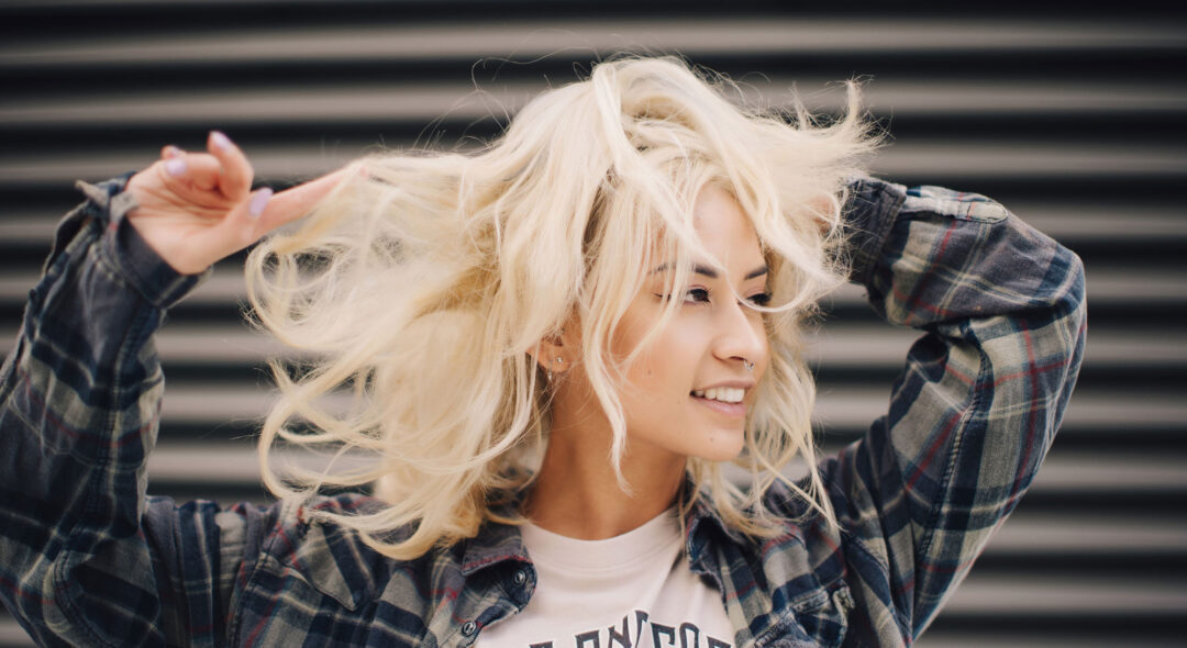 woman playing with her hair