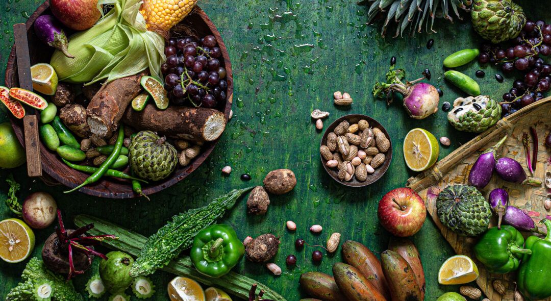 Fresh Seasonal Produce on green background