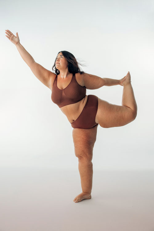 portrait of Carmen Rene in studio doing a ballet pose