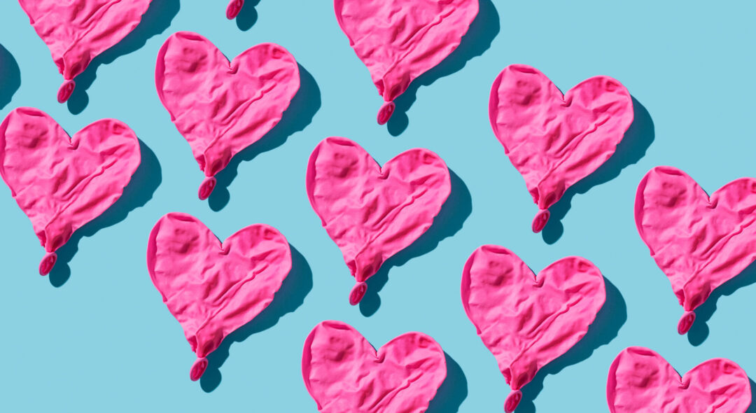 deflated hearts on blue background