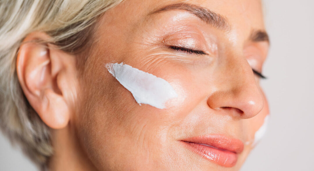 Woman with Facial Cream Smiling
