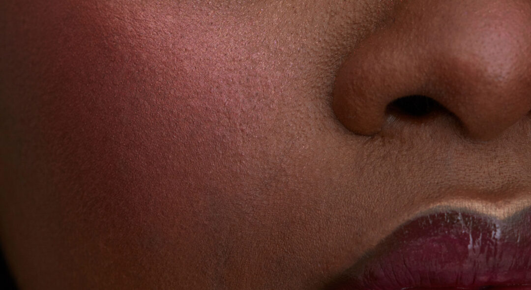 Portrait of woman wearing makeup with eyes closed