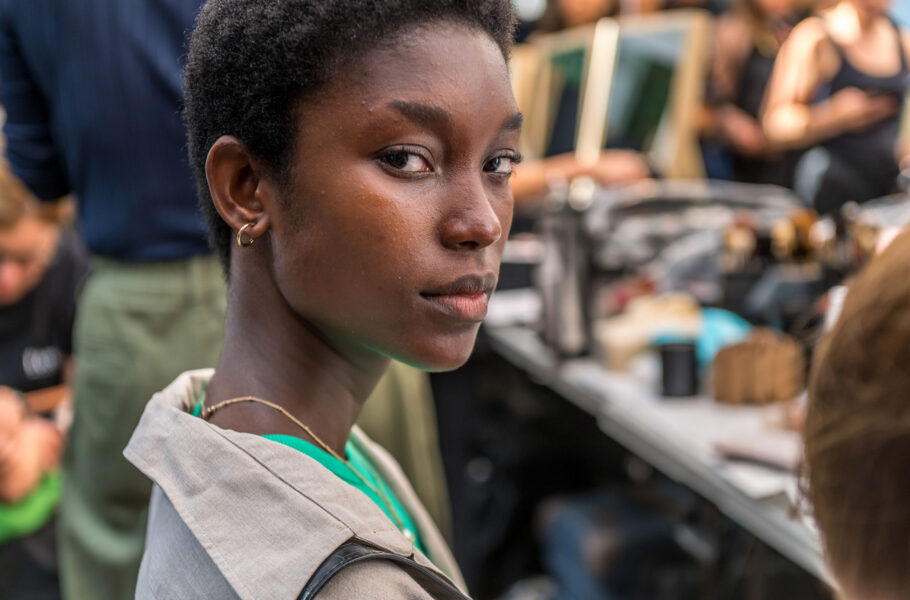 model backstage getting ready for a fashion week show