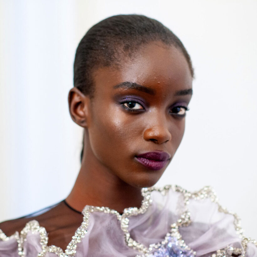 Model Maty Fall poses backstage prior to the ArdAzAei Haute Couture Fall Winter 2022 2023 show as part of Paris Fashion Week on July 07, 2022 in Paris, France