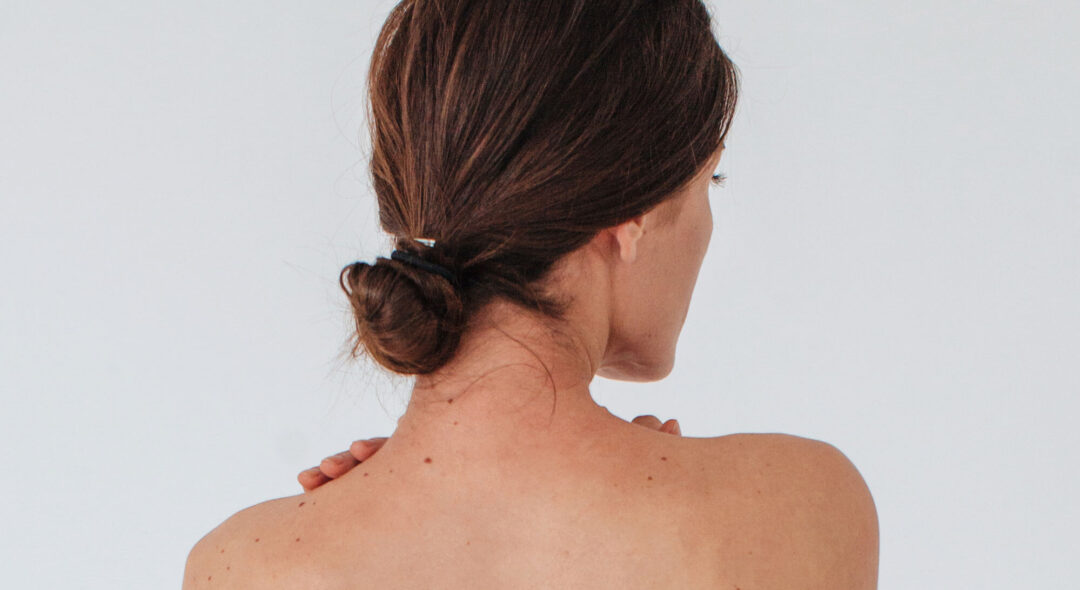close up of back of woman's shoulders