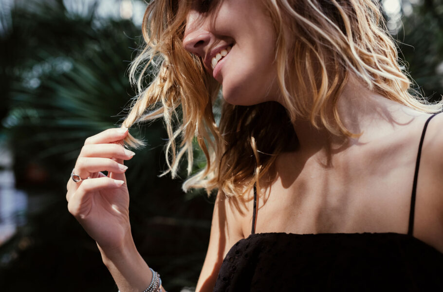 close up of woman touching hair