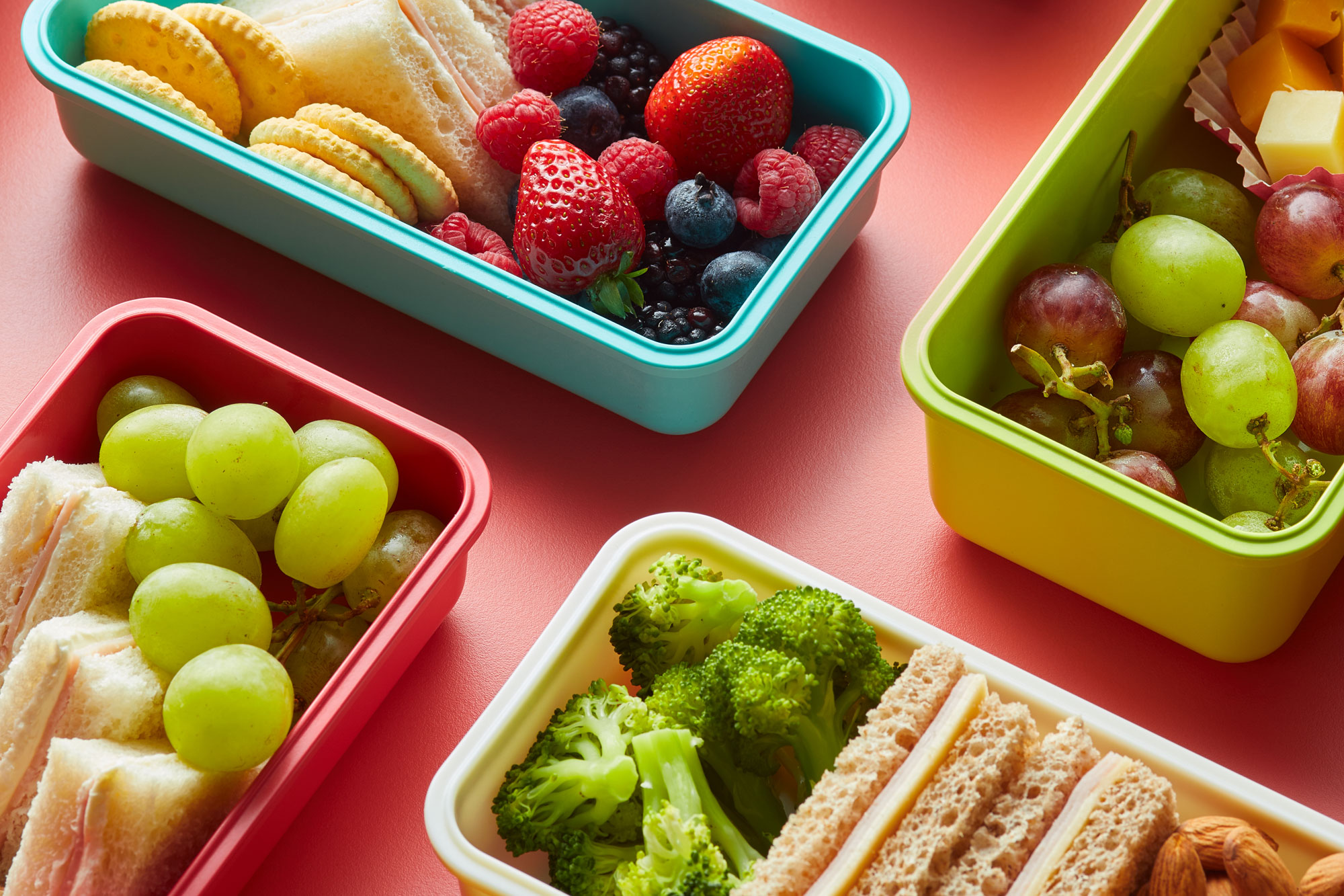 Healthy food in colorful lunchboxes