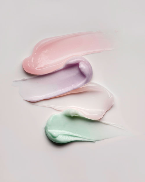 set of cream swatches on white background
