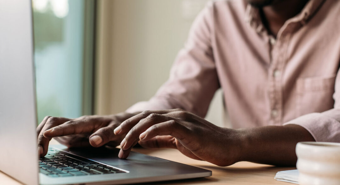 Man Working at Laptop