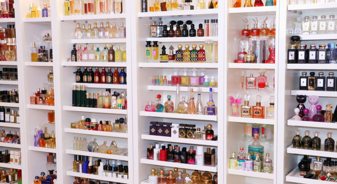 closet full of perfume bottles