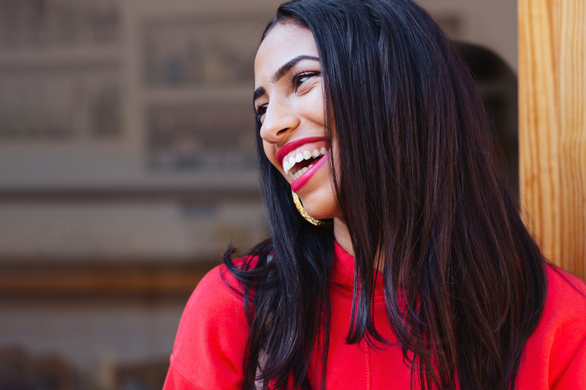 woman wearing red lipstick smiling