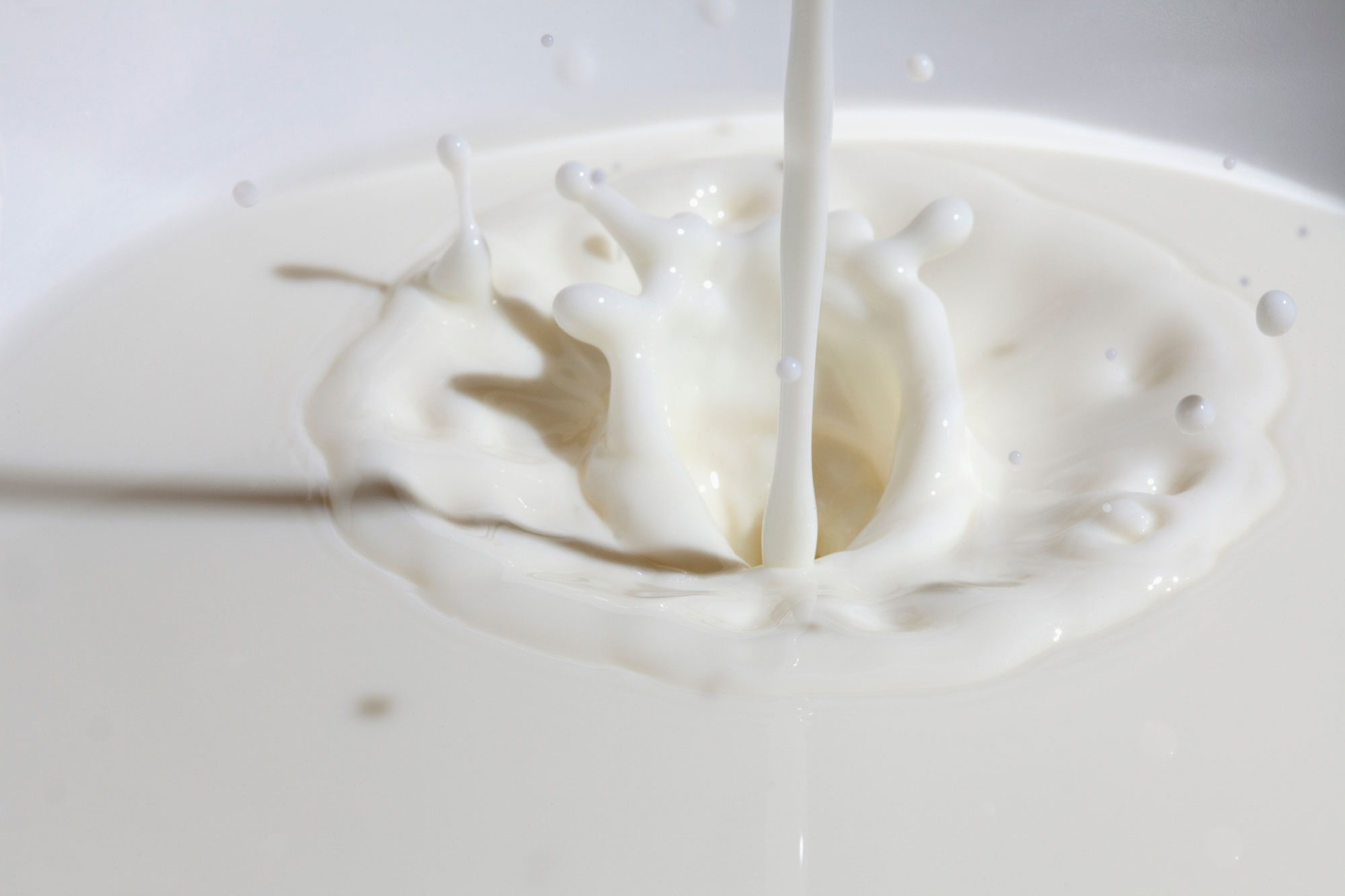 close up of milk being poured
